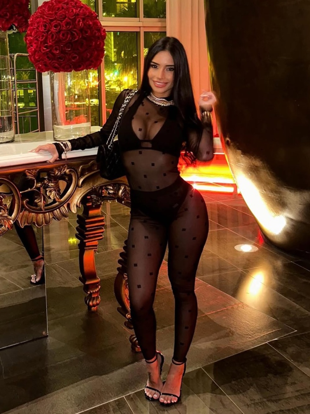 Sheer Givenchy bodysuit